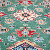 Pattern detail of green & ivory Kazak-inspired wool rug 29640.