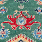 Pattern detail of green & ivory Kazak-inspired wool rug 29640.