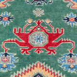 Pattern detail of green & ivory Kazak-inspired wool rug 29640.