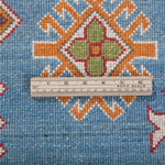Wool pile close-up of blue & red Kazak-inspired wool rug 24986.