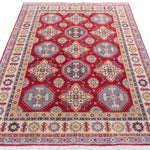 Full view from a low angle of red & blue Kazak-inspired wool rug 21988.