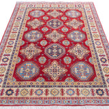 Full view from a low angle of red & blue Kazak-inspired wool rug 21988.