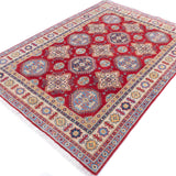 Full view at an angle of red & blue Kazak-inspired wool rug 21988.