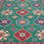 Pattern detail of green & blue Kazak-inspired wool rug 29639.