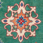 Pattern detail of green & blue Kazak-inspired wool rug 29639.