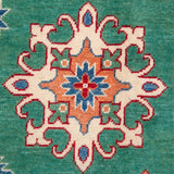 Pattern detail of green & blue Kazak-inspired wool rug 29639.