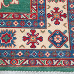 Border and edge detail of green & blue Kazak-inspired wool rug 29639.