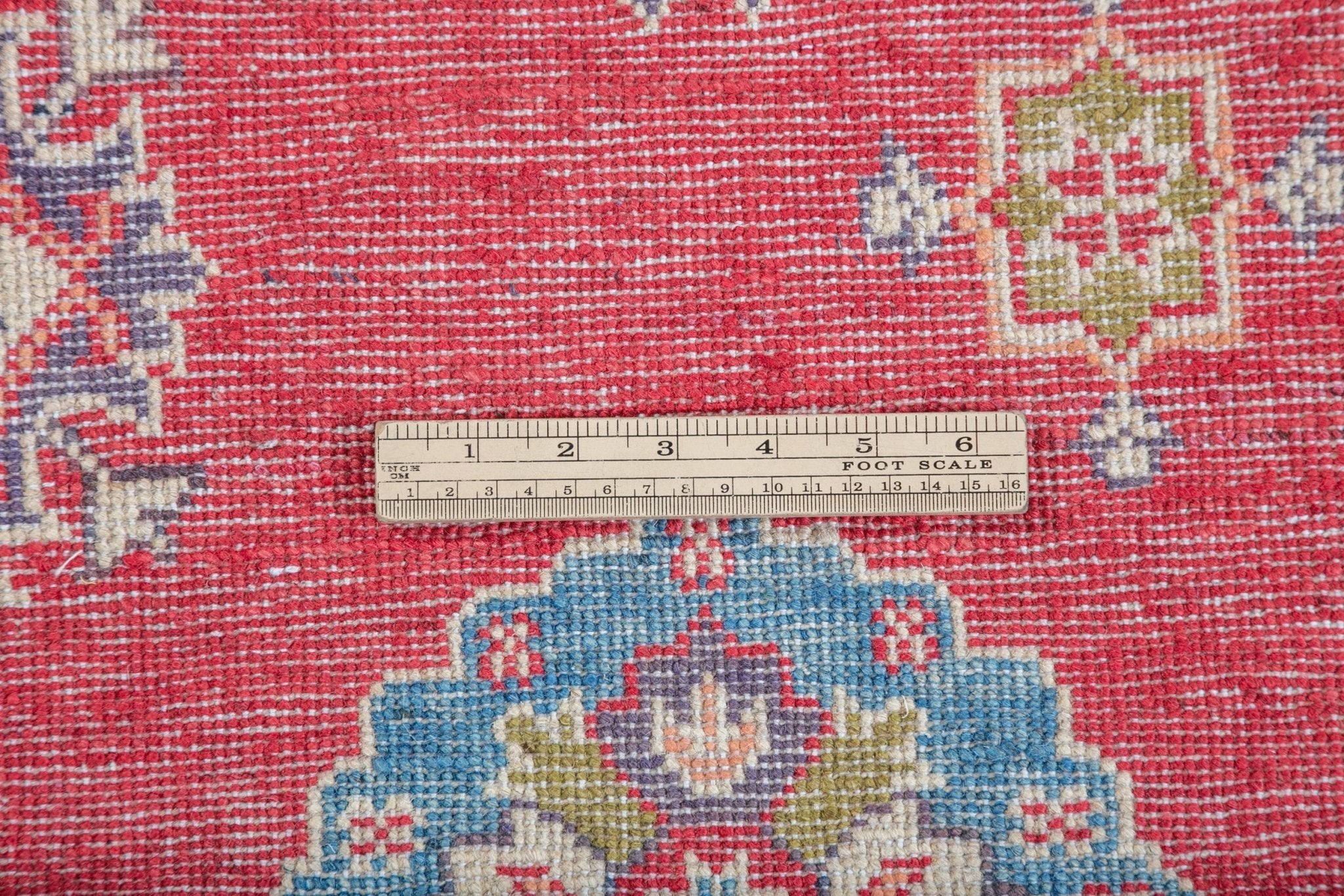 Wool pile close-up of red & blue Kazak-inspired wool rug 24995.