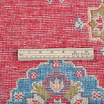 Wool pile close-up of red & blue Kazak-inspired wool rug 24995.