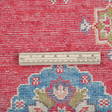 Wool pile close-up of red & blue Kazak-inspired wool rug 24995.