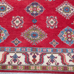 Pattern detail of red & blue Kazak-inspired wool rug 24995.