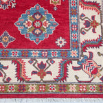 Border and edge detail of red & blue Kazak-inspired wool rug 24995.