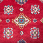Pattern detail of red & blue Kazak-inspired wool rug 24995.