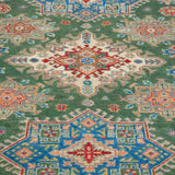 Pattern detail of green & blue Kazak-inspired wool rug 29637.
