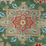 Pattern detail of green & blue Kazak-inspired wool rug 29637.