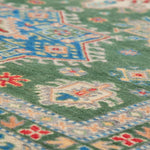 Pattern detail of green & blue Kazak-inspired wool rug 29637.