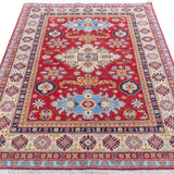 Full view from a low angle of red & ivory Kazak-inspired wool rug 21989.
