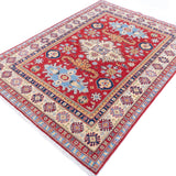 Full view at an angle of red & ivory Kazak-inspired wool rug 21989.
