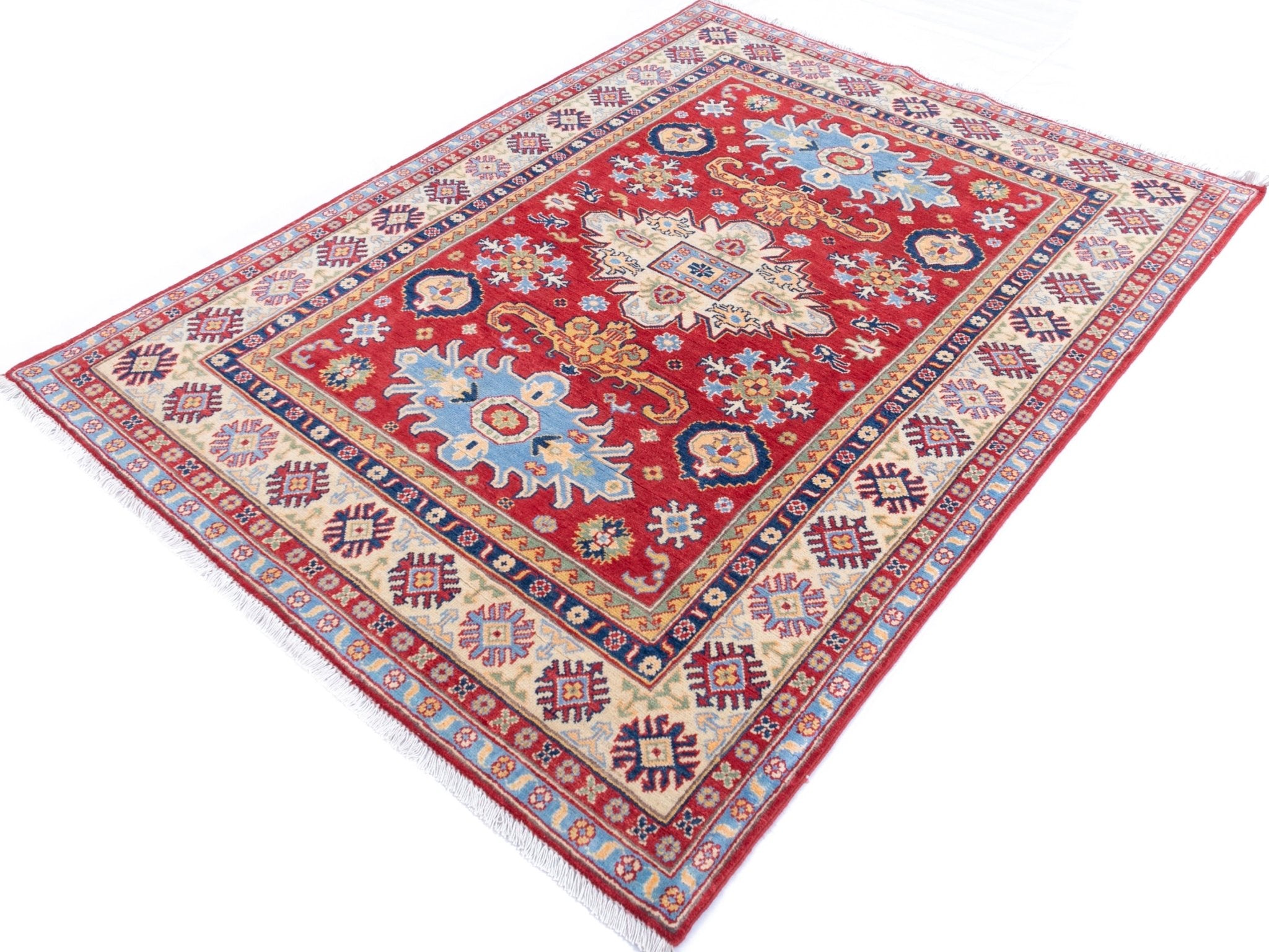 Full view at an angle of red & ivory Kazak-inspired wool rug 21989.