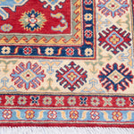 Border and edge detail of red & ivory Kazak-inspired wool rug 21989.