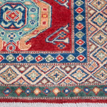 Border and edge detail of red & blue Kazak-inspired wool runner 29654.