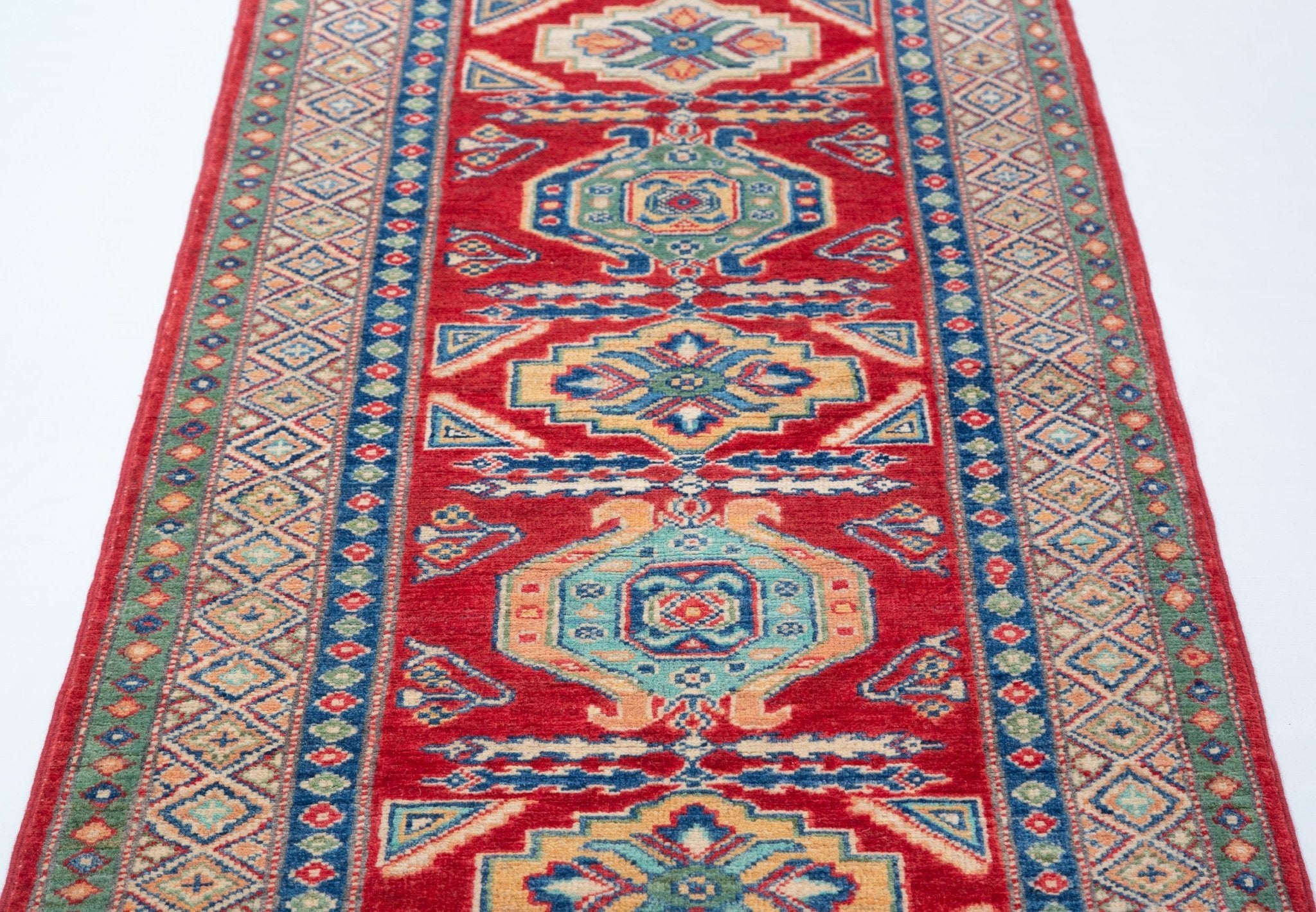 Pattern detail of red & blue Kazak-inspired wool runner 29654.