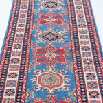 Border and edge detail of blue & red Kazak-inspired wool runner 29653.