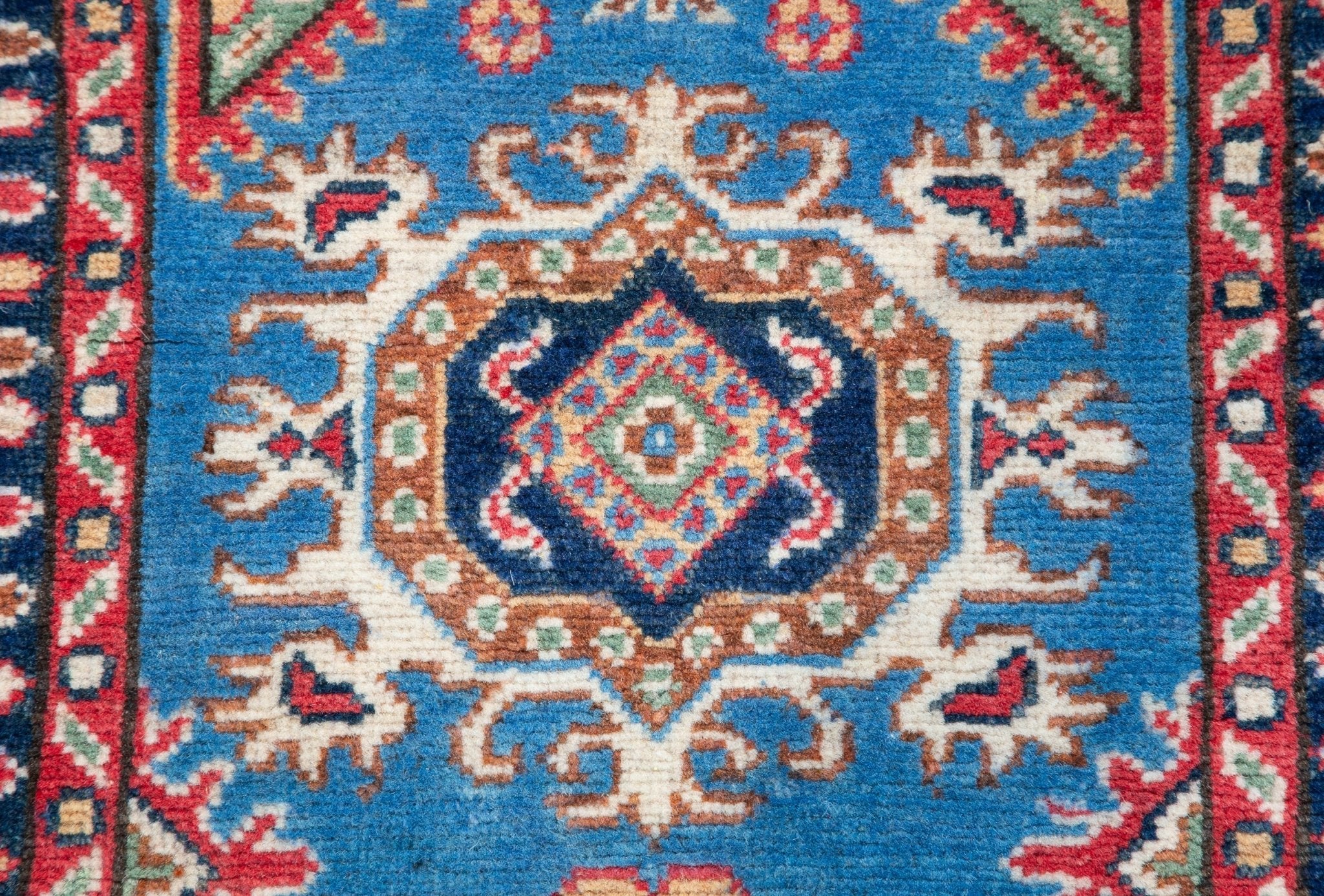 Pattern detail of blue & red Kazak-inspired wool runner 29653.