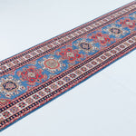 Full view at an angle of blue & red Kazak-inspired wool runner 29653.