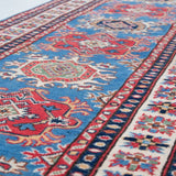 Pattern detail of blue & red Kazak-inspired wool runner 29653.