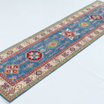 Full view at an angle of blue & ivory Kazak-inspired wool runner 29655.