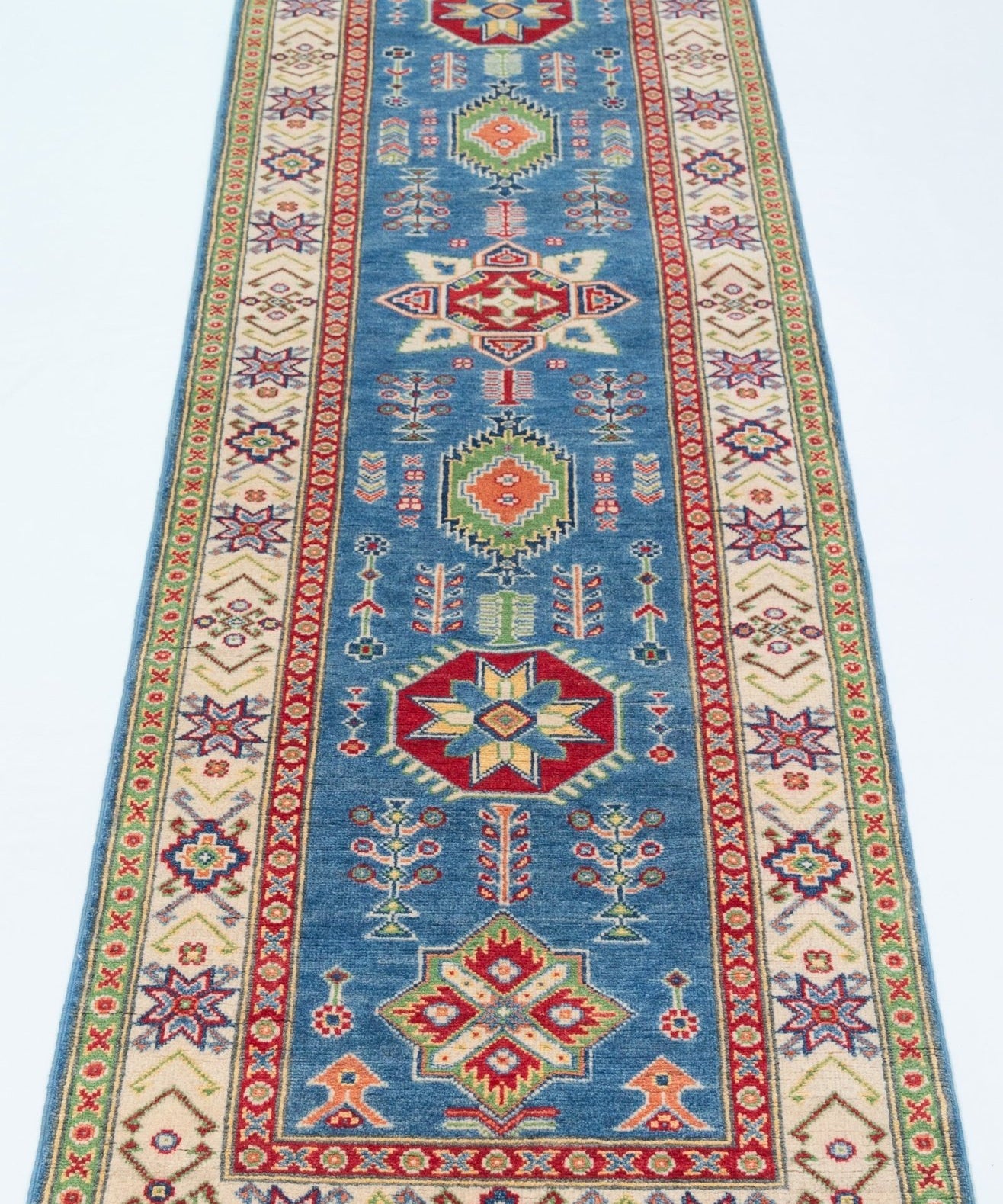 Full view from a low angle of blue & ivory Kazak-inspired wool runner 29655.