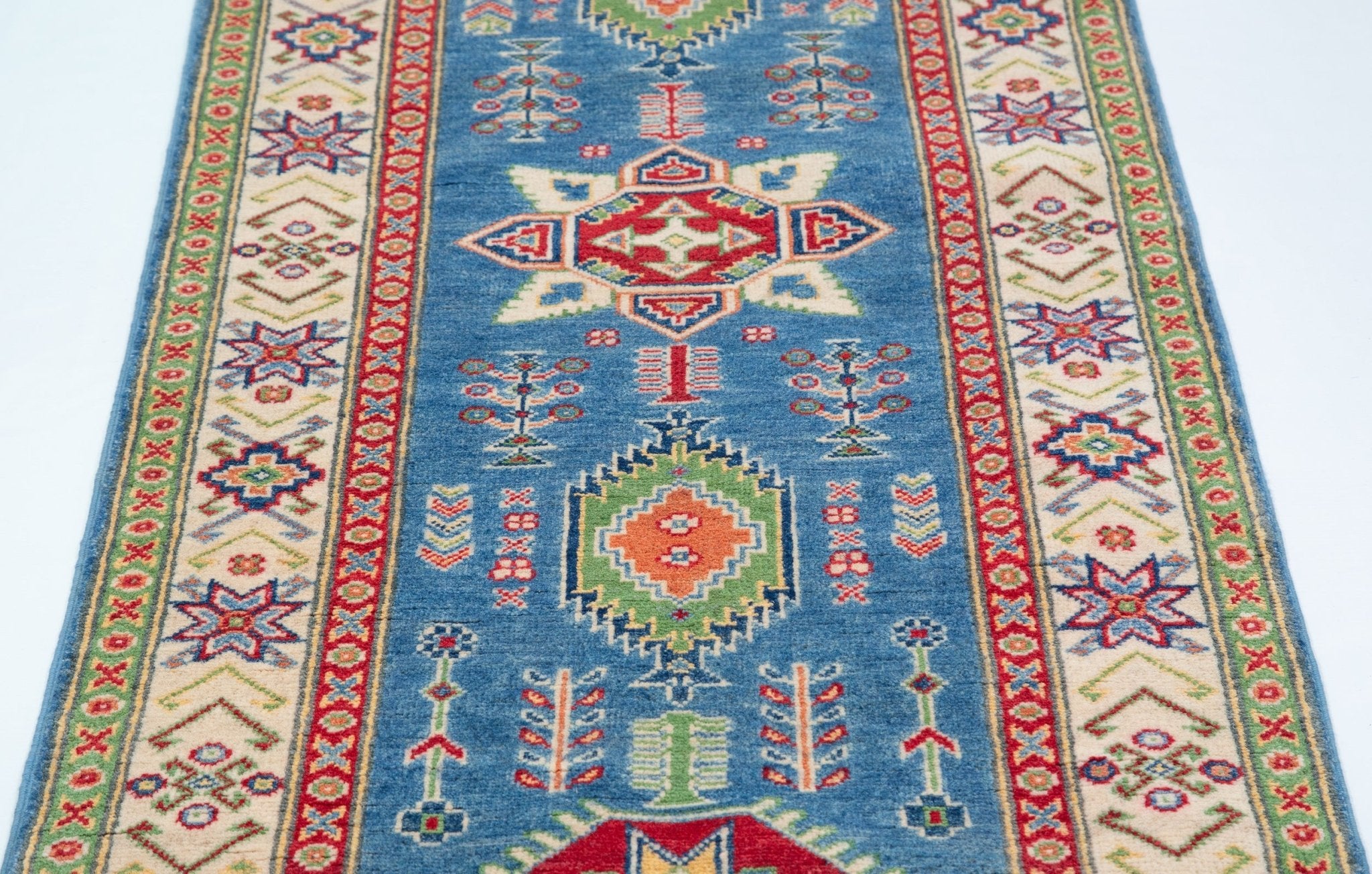 Pattern detail of blue & ivory Kazak-inspired wool runner 29655.
