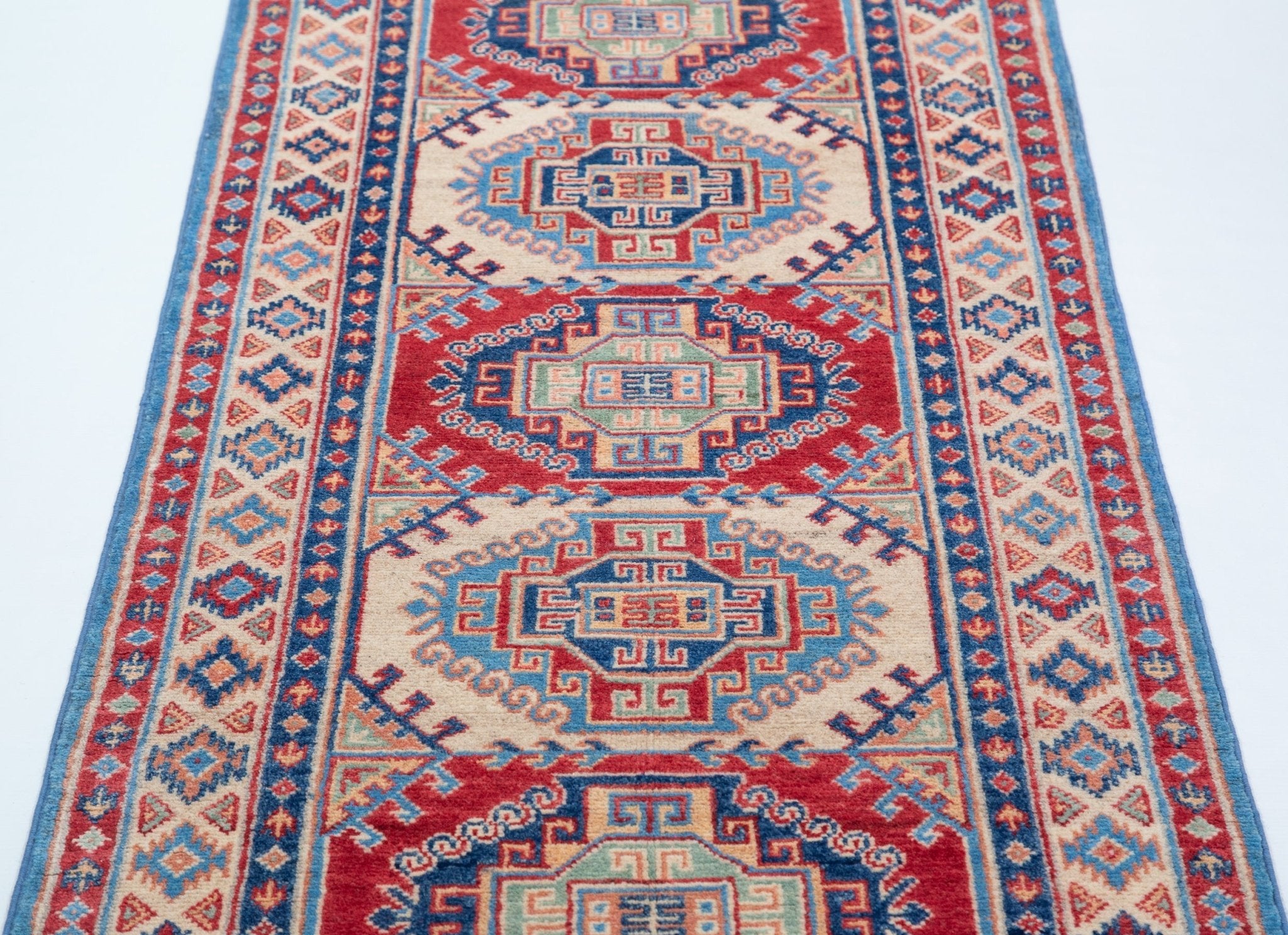 Pattern detail of blue & red Kazak-inspired wool runner 29656.