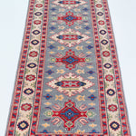 Full view from a low angle of blue & ivory Kazak-inspired wool runner 29657.