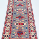 Full view from a low angle of blue & ivory Kazak-inspired wool runner 29657.