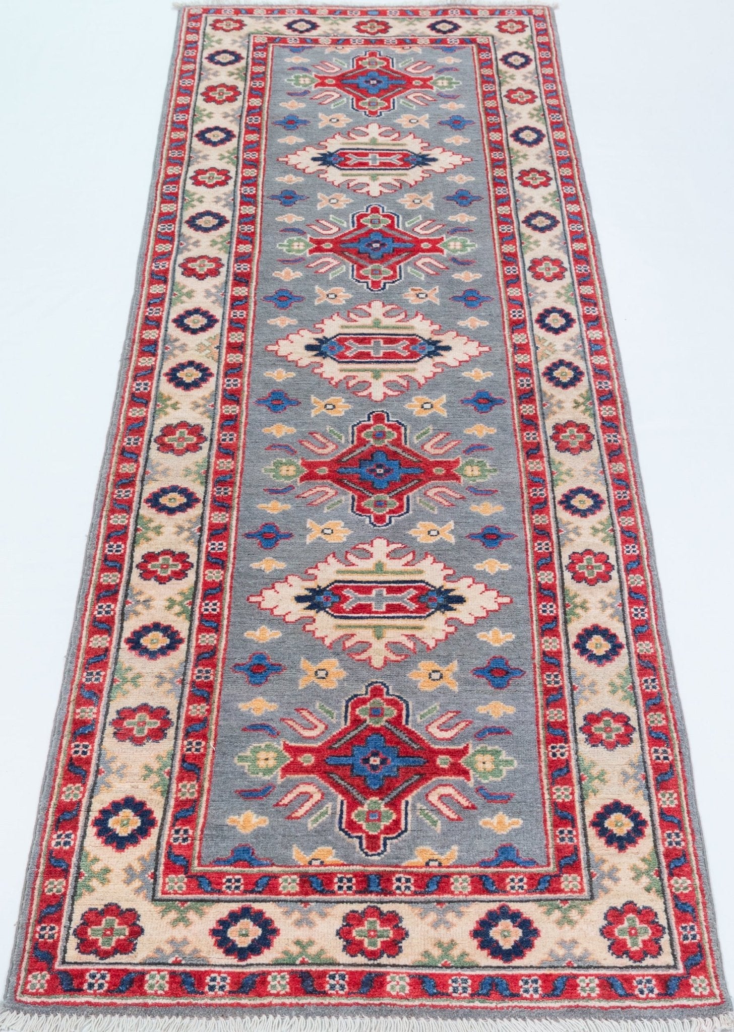 Full view from a low angle of blue & ivory Kazak-inspired wool runner 29657.