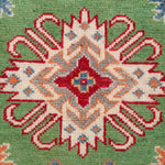 Pattern detail of green & red Kazak-inspired wool runner 29353.