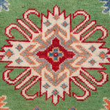 Pattern detail of green & red Kazak-inspired wool runner 29353.