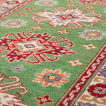 Pattern detail of green & red Kazak-inspired wool runner 29353.