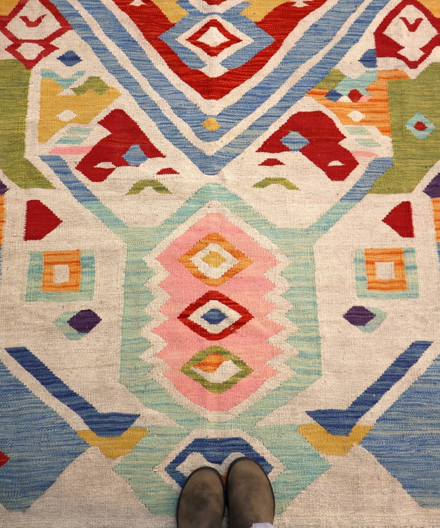 Geometric kilim rug with central diamond medallion and multicolor diamond motifs