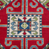 Pattern detail of red & green Kazak-inspired wool rug 24948.