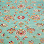 Pattern detail of turquoise & red Kazak-inspired wool rug 29664.