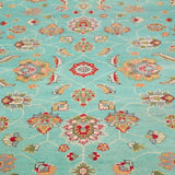 Pattern detail of turquoise & red Kazak-inspired wool rug 29664.