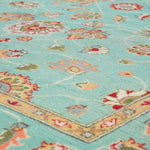 Pattern detail of turquoise & red Kazak-inspired wool rug 29664.