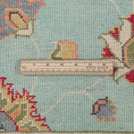 Wool pile close-up of turquoise & red Kazak-inspired wool rug 29664.
