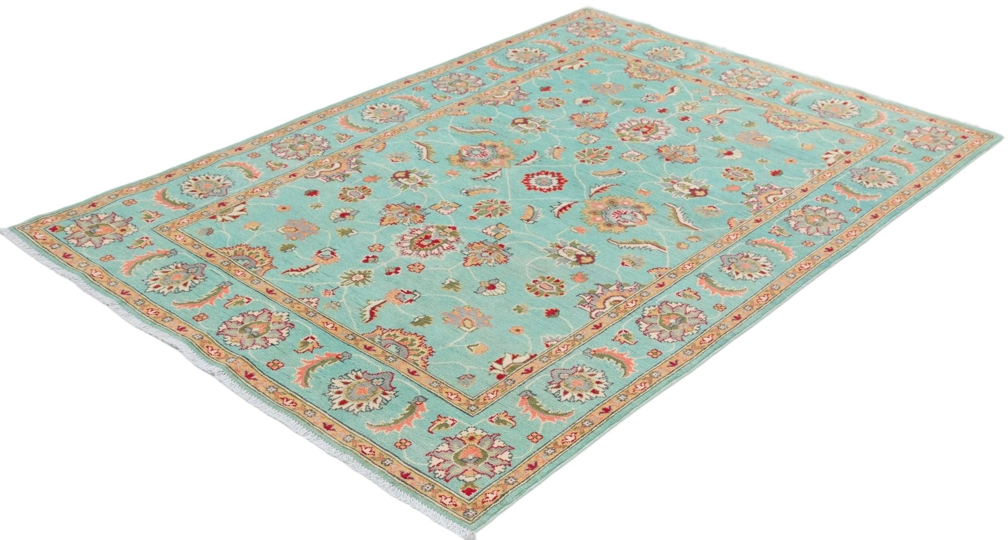 Full view at an angle of turquoise & red Kazak-inspired wool rug 29664.
