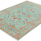 Full view at an angle of turquoise & red Kazak-inspired wool rug 29664.