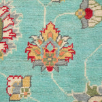 Pattern detail of turquoise & red Kazak-inspired wool rug 29664.