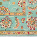 Border and edge detail of turquoise & red Kazak-inspired wool rug 29664.